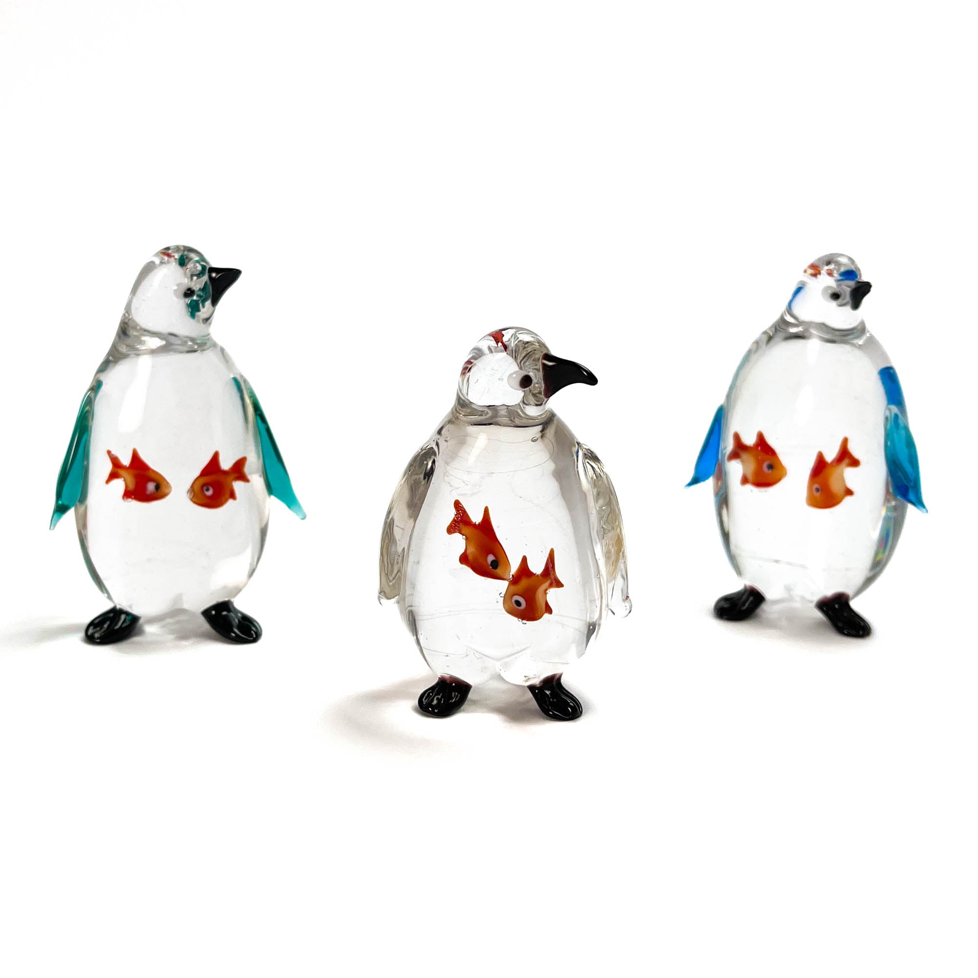 Penguin swallowing a fish - Murano Glass