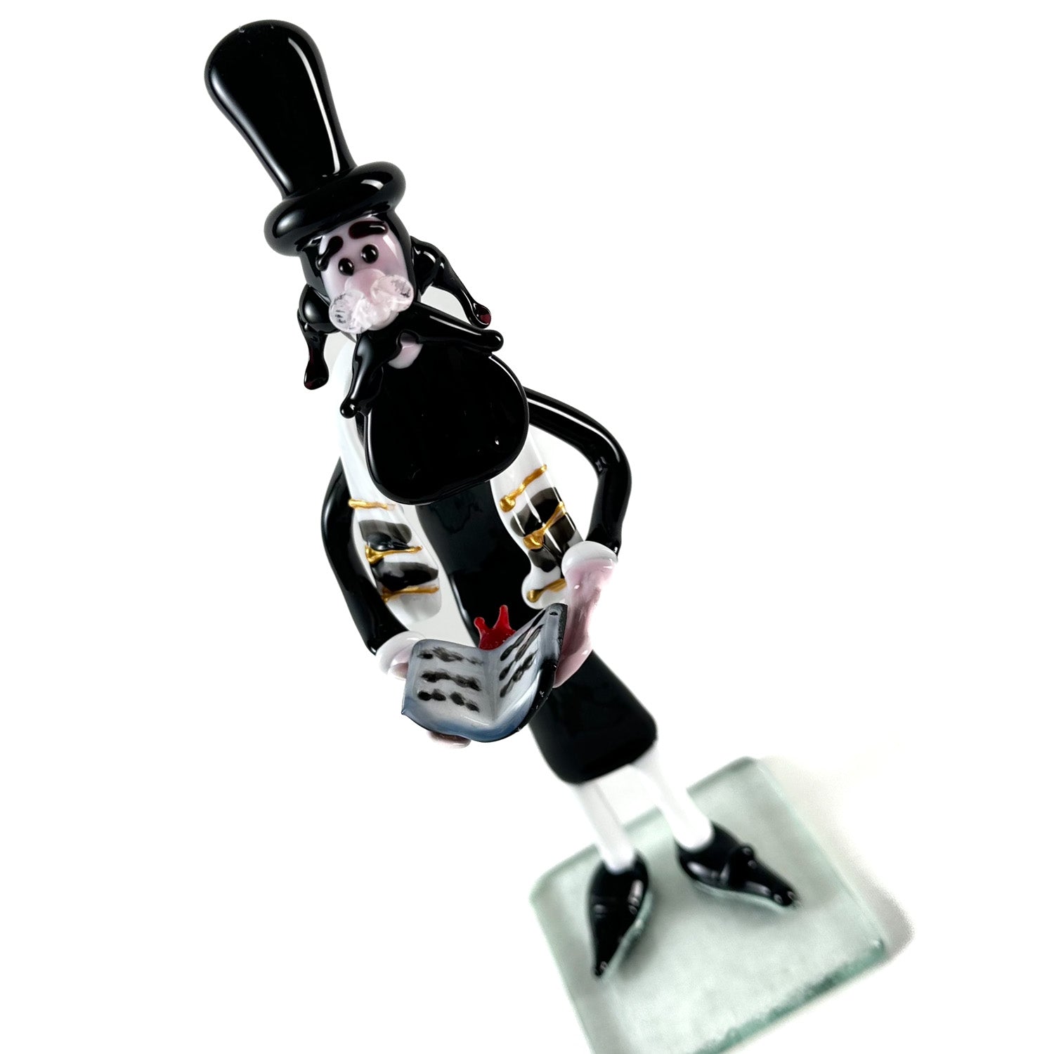 Figurine de rabbin avec Talmud